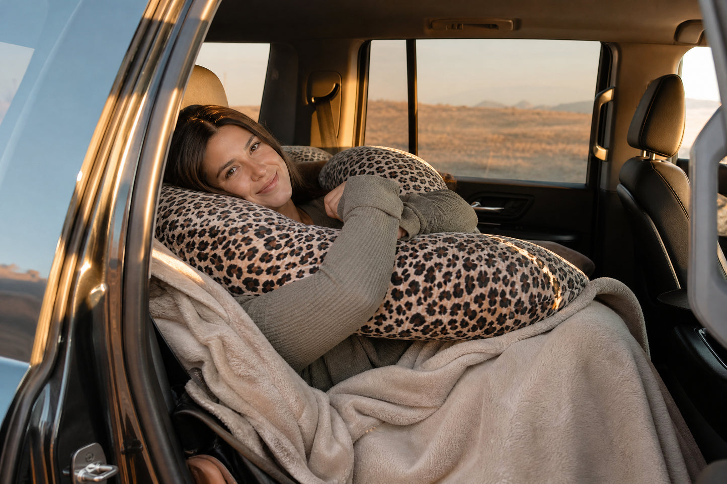 Woman relaxing in car with Passenger Princess Pillow
