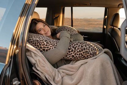 Woman relaxing in car with Passenger Princess Pillow