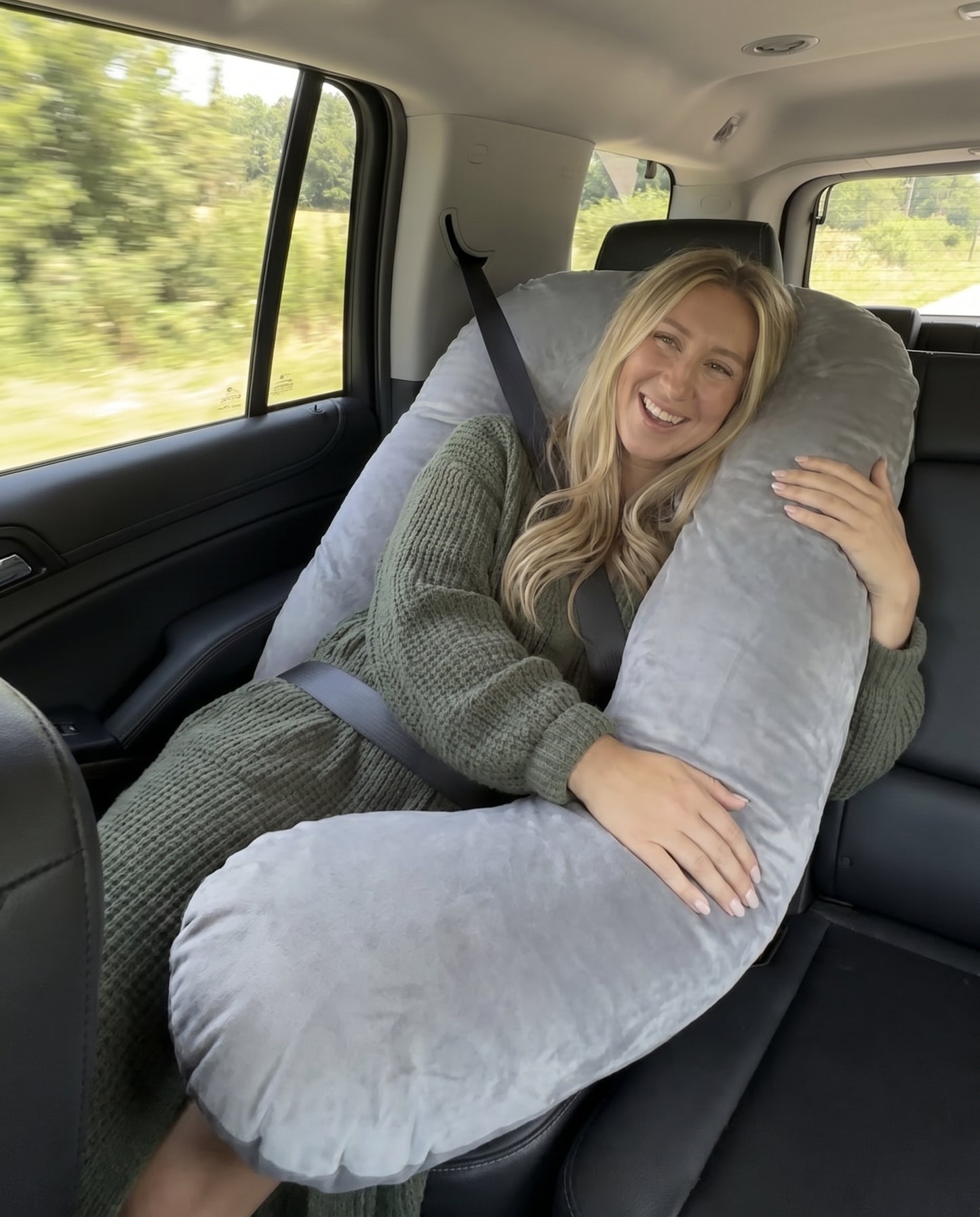 Passenger Princess Pillow Grey in car with seatbelt