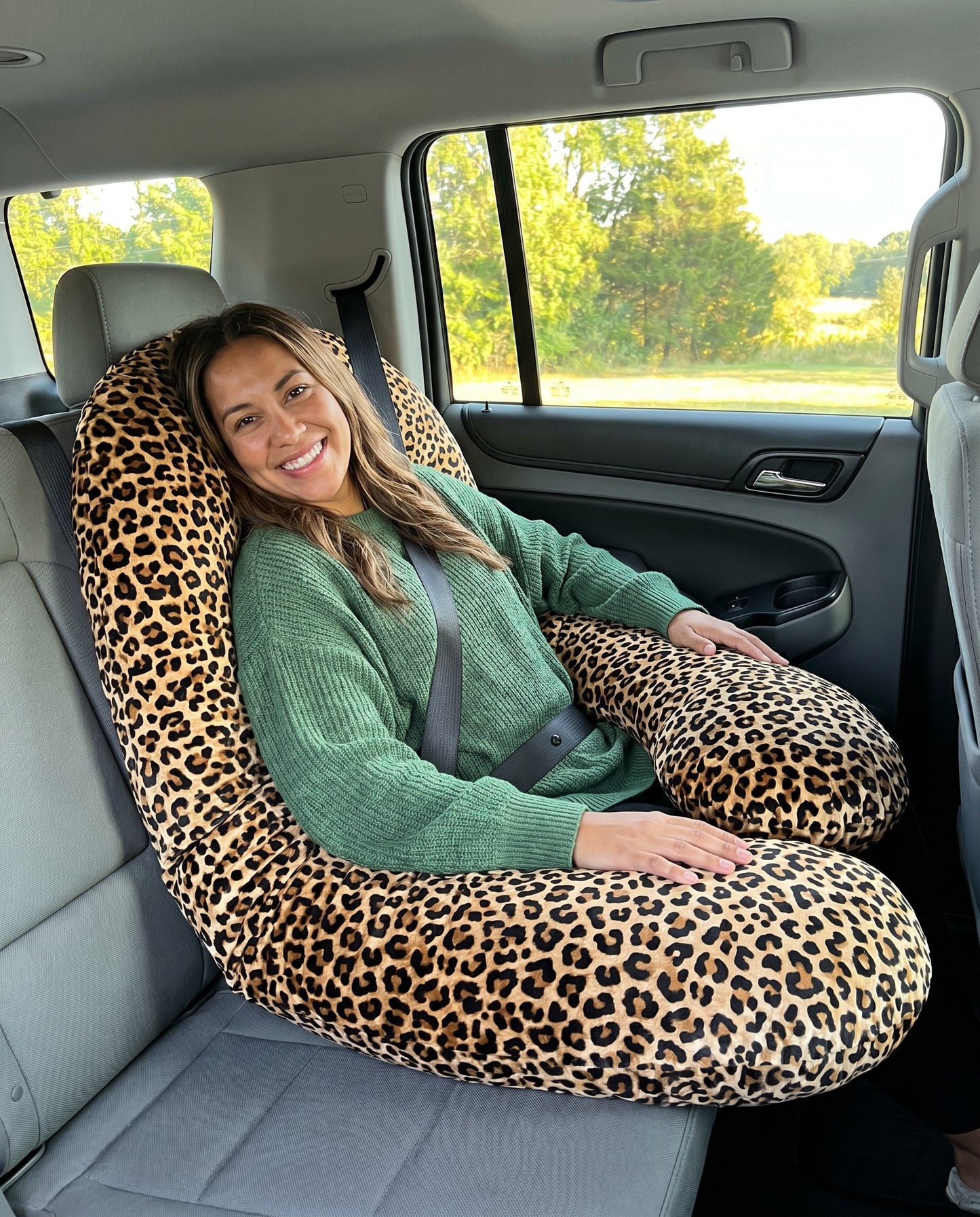 Passenger Princess Pillow Leopard Print in car with seatbelt